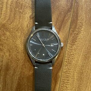 Caravelle Silver Watch Case with green Leather Strap